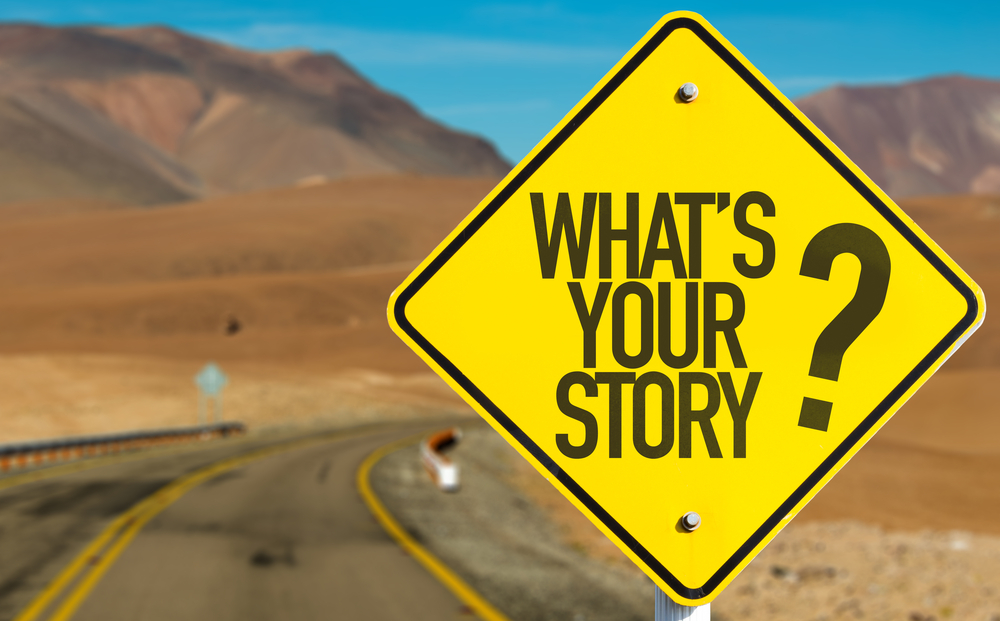 Whats Your Story? sign on desert road Whats Your Story? sign on desert road